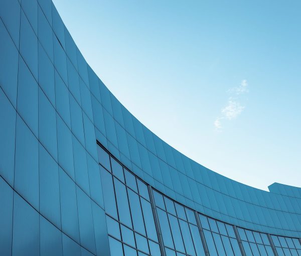 corporate-building-blue-sky-background-with-isolated-place-text corporate-building-blue-sky-background-with-isolated-place-text