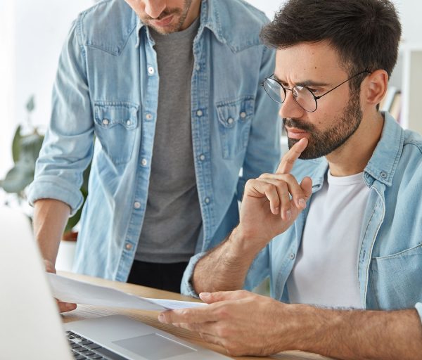 two-successful-stylish-man-financiers-analyze-business-documents-work-new-startup-project two-successful-stylish-man-financiers-analyze-business-documents-work-new-startup-project